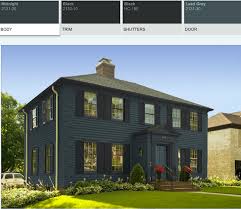 Modern blue siding exterior maison house cumulus clouds sky background. Is A Dark Exterior House Color A Good Idea Laurel Home