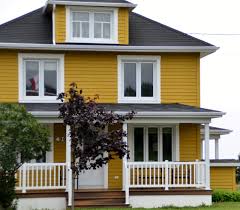 16// kendall charcoal by benjamin moore. Exterior Paint Colors Ideas To Make Your House Look Welcoming Talkdecor Yellow House Exterior House Exterior Blue House Paint Exterior