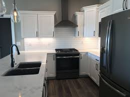 white kitchen cabinets, black hardware