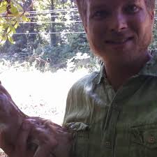 Alabama man finds baby deer laying in roadway, returns it to the woods