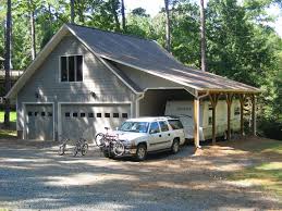 Make Wall More Interesting With T1 11 Siding T1 11 Siding Installation With Wood Column And Dark Roof For Exterior Garage Design Garage Plans Detached Garage