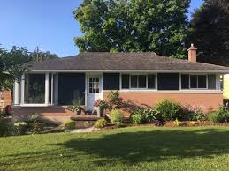 A timeless classic, this deeply saturated shade of navy blue evokes rich maritime traditions and storied exploits at sea. Brick Trim And Front Door Color With Hale Navy Siding