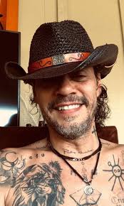 What do Marc Anthony's tattoos mean to him?