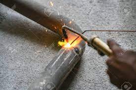 Worker Welding Joint Steel Exhaust Pipe Of Car Stock Photo Picture And Royalty Free Image Image 94123407
