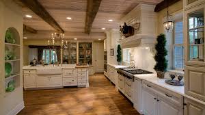 A great way to make a farmhouse kitchen is replacing the center of your cabinets with chicken wire. Hinsdale Farmhouse Kitchen Remodel Drury Design