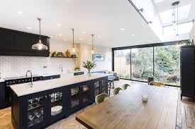 They tend to incorporate big, boxy shapes like kitchen islands and chunky work. An Industrial Style Kitchen Extension By Burlanes Industrial Kitchen London By Burlanes Interiors Houzz