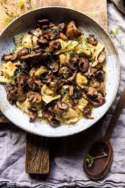 Herby Buttered Balsamic Mushroom Ravioli Half Baked Harvest Recipe Mushroom Ravioli Stuffed Mushrooms Balsamic Mushrooms