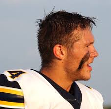 High school football pageantry begins for Michigan's varsity teams