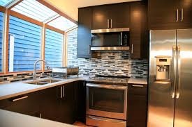 The marble countertop is so enchanting. 75 Beautiful Kitchen With Black Cabinets And Blue Backsplash Pictures Ideas July 2021 Houzz