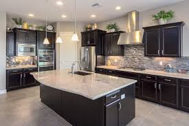 Love This Kitchen With Dark Cabinets Light Granite Countertops Home Decor Kitchen Elegant Kitchens Home Kitchens