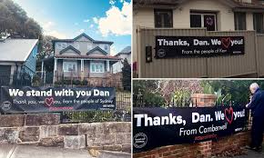 Video message from @danielandrewsmp announcing his return to work. Banner Supporting Victorian Premier Daniel Andrews Seen Outside Mosman Mansion In Sydney Daily Mail Online