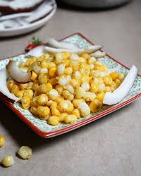 Boiled corn and coconut is back in the day snack/ street food . : Growing up I always saw this combo in those glass boxes being hawked on the street. I hardly