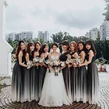 Gorgeous Ombre Grey Bridesmaids Dresses With Delicate White And Pink Bouquets It Seem Ombre Wedding Dress White Bridesmaid Dresses Winter Bridesmaid Dresses
