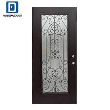 The rich and elegant double door design features a wooden frame with a metallic grill and a frosted glass to conceal the interiors. China Fangda Simple Style Front Iron Window Grill Door Design China Wrought Iron Door Safety Steel Door
