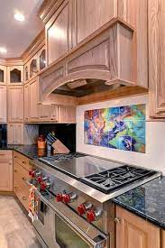Our mural tiles are used in kitchen backsplashes, bathroom showers, any indoor wall or outdoor this ceramic mural comprised of 12 individual tiles is the perfect backdrop to any kitchen or space. Custom Tile Murals Accent And Outdoor Tile Murals Tile Murals By Artists Commercial Tile Services Tile By Design