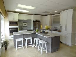 Woodharbor Designer White Kitchen Silverwood Island Alley Design To Build Showroom Naples Florida Kitchen Remodel White Shaker Cabinets White Kitchen