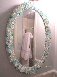 Many people ignore mirrors and just fix them to a cupboard or have a frameless mirror in your bathroom. Pin By Doro Vdd On Bathroom Ideas Sea Glass Crafts Diy Bathroom Beach Theme Bathroom