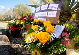 Yellow flowers, ribbons offer hope for Nancy Guthrie's neighbors