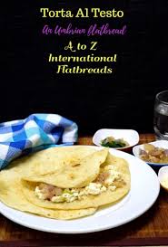 L'impasto si ottiene impastando a mano ingredienti molto semplici: Torta Al Testo An Umbrian Flatbread