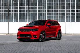 The Most Extreme Jeep Cherokee Srt Seen Boasting 1 000 Hp And Ferrada Wheels Jeep Grand Cherokee Srt Jeep Grand Cherokee Jeep Grand