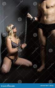 BDSM Concept. Beautiful Submissive Tied with Chain Stock Image - Image of  pretty, female: 51471337
