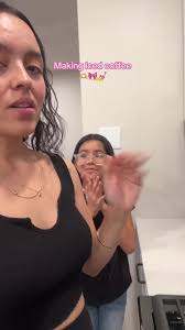 Mom Making Coffee with Daughter Latina