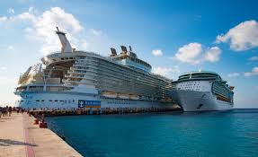 A beach pool where the seating area slopes right into the water; Allure Of The Seas A Caribbean Dream Come True