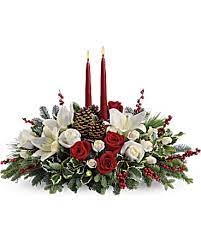 Two days to have roses delivered for a. Christmas Wishes Centerpiece Bouquet Teleflora