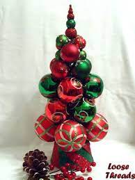 It is perfect to place on a mantle, table, or just to accent your decor. Knitting Needle Christmas Tree Christmas Tree Crafts Cute Christmas Tree Tree Crafts
