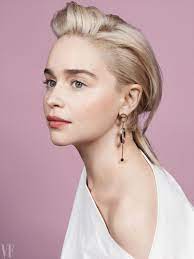 showing off her blonde locks emilia clarke wears the row top and yael sonia earrings emilia clarke emilia clarke style emelia clarke