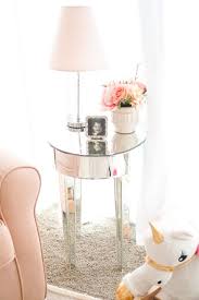 Blogger Katelyn Jones A Touch Of Pink Nursery Mirrored Side Table Girl Nursery Baby Girls Nursery Pink Nursery
