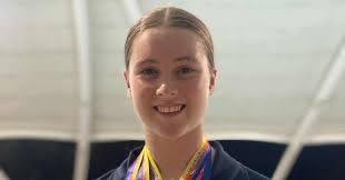 Anthony Den Hartog began teaching guitar at Beaconhills College Pakenham  Campus in 1991, making him the second-longest serving staff member at the  College. In this photo from the early '90s, he is