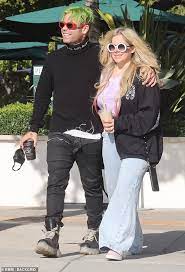 Professional rocker, singer songwriter, clothing designer and philanthropist. Avril Lavigne Beams As She Walks Arm In Arm With Boyfriend Mod Sun In Malibu Geeky Craze