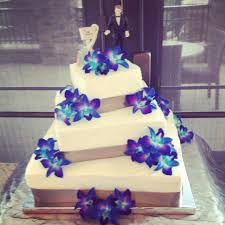 Whether you pick a classic round cake in white or a quirky look for one that features natural elements, colors like white, blue, purple and silver, and snowy scenes. 3 Tier 6 Layer Wedding Cake With Blue Orchids By Anna Payne With Paynefully Delicious Cakes Annapa Wedding Cakes Blue Purple Wedding Cakes Dream Wedding Cake