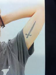Sword Tattoo Upper Inner Arm Sword Tattoo Tattoos Inner Bicep Tattoo