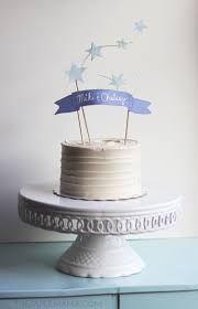 The words happy and birthday on a small plinth with two prongs on each word to stick in the cake. Star And Banner Cake Topper With Free Printables