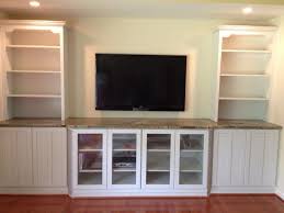Living Room Massive Glass Door Wood Wall Mounted Tv Cabinet Under Recessed Lamps Wood Wall Mounted Tv Built In Tv Wall Unit Built In Wall Units Tv Wall Unit