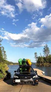 3 kayaks on roof rack