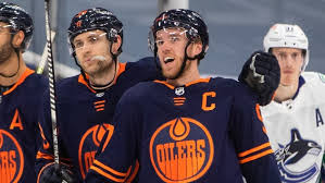 How taylor hall's prior career stops led to his 2021 renaissance with the bruins. Mcdavid Reaches 100 Point Milestone In Win Over Canucks Cbc Sports