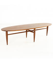 Elliptical etr surfboard coffee table by charles ray eames for vitra 2007 at pamono platinum replica home decor vintage hermann miller 1960s design market wire base accent herman cocktail 1950s 4933 1stdibs e style swiveluk com a you can transport in your convertible office within reach. Restored Mersman Mid Century Walnut Surfboard Coffee Table