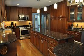 Cherry Oak Wood With Black Granite Countertops Gorgeous Kitchen Remodel By Ohana Construction Inc Cherry Cabinets Kitchen Cherry Kitchen Kitchen Cabinets