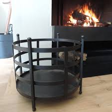 Porte Buches En Metal Noir Ajoure 4 Pieds Decoclico Factory Decoclico Accessoires De Cheminee Porte Buche Mobilier De Salon