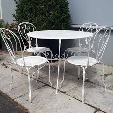 Wayfair was great, as they replaced the table at no cost to me. Old Gardenset White Iron Table With Four Chairs Piet Jonker