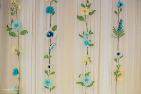 Wedding floral centerpieces for guest tables should be smaller, and therefore will cost less. Diy Paper Flower Backdrop Tips And Tricks