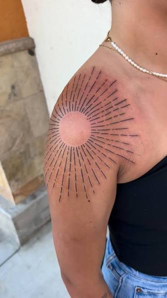 Sun On Shoulder Tattoo