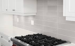 This subway tile kitchen backsplash uses rectangular tiles that look vintage. Kitchen Tiles Backsplash Backsplash Grey Kitchen Splashback Tiles