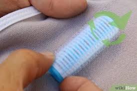 Put the piece of clothes on a flat surface and make sure it is well. 3 Ways To Remove Pilling From Clothing Wikihow