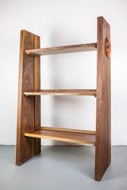 23.5 x 11.75 x 7.75 h. Shelves