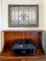 a vintage dry sink printer stand is