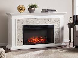 Lots of styles to choose from: Canyon Heights Electric Fireplace Mantel Package In White Stone Electric Fireplace Faux Stone Electric Fireplace White Fireplace